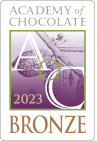 Academy of Chocolate 2023 brončana nagrada – ljubičasto-zeleni logo s ilustracijom kakaovca.